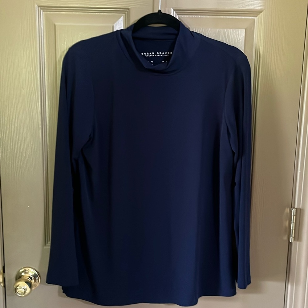 Navy blue long sleeve top.